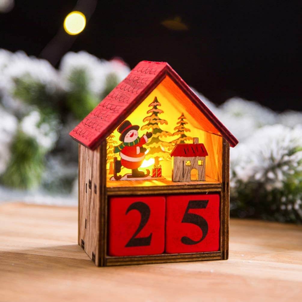 Calendário de contagem para o Natal em formato de casinha.