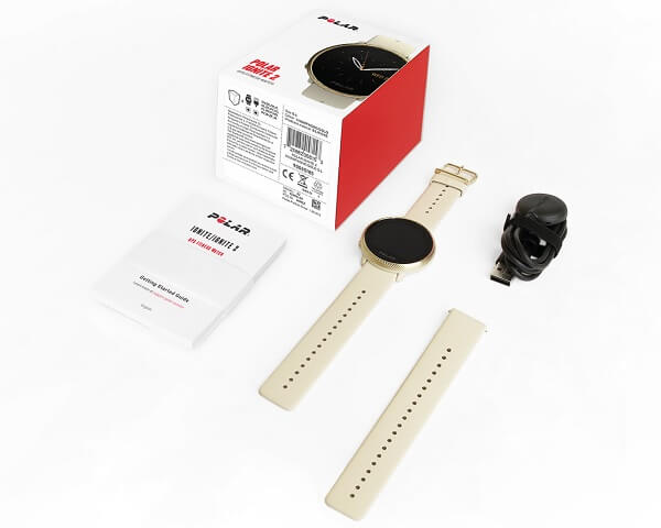 Relógio Polar Ignite 2 com caixa, pulseira de silicone, carregador e manual do usuário.
